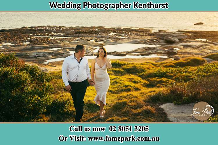 Photo of the Groom and the Bride walking near the lake Kenthurst NSW 2156