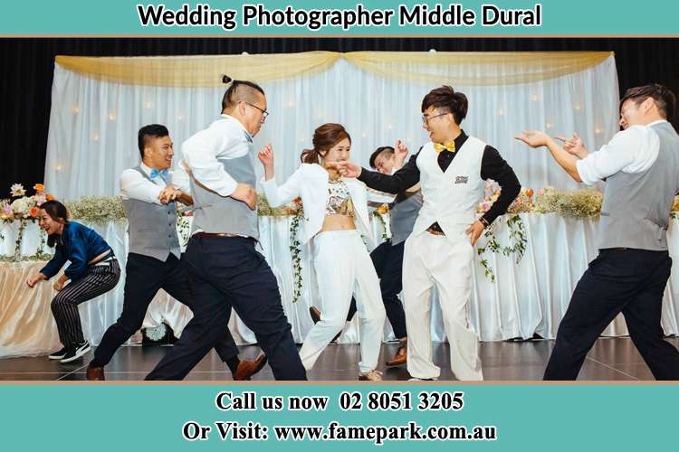 Photo of the Bride and the Groom dancing with the groomsmen Middle Dural NSW 2158